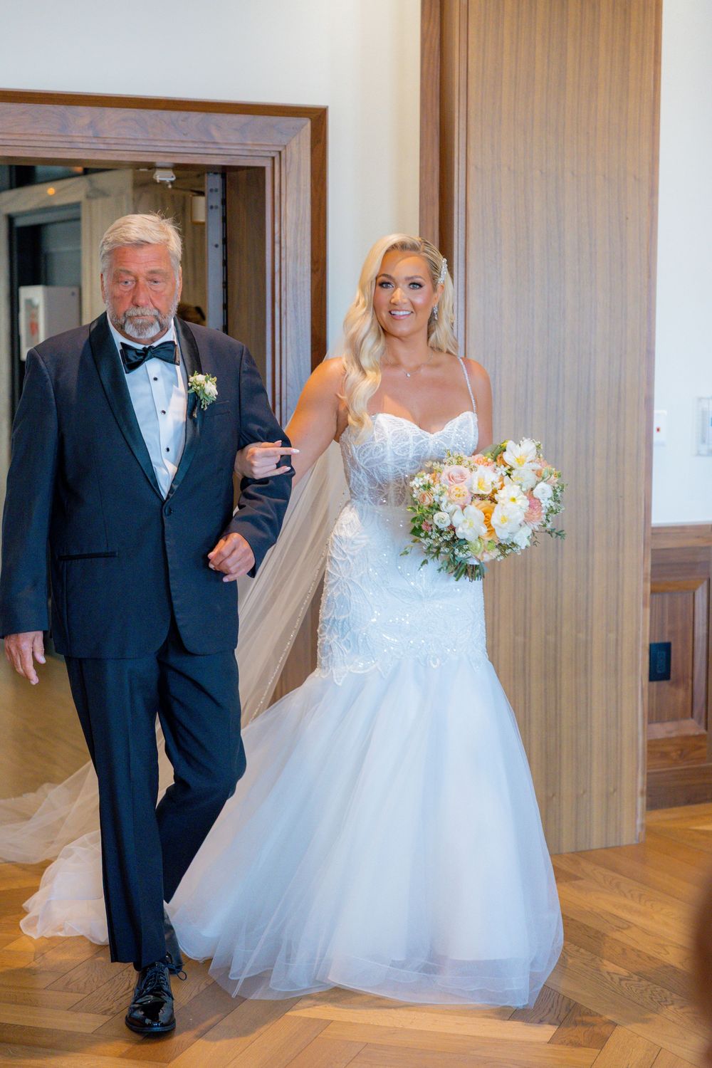 Wedding reception details at Book Tower Detroit with elegant table settings and city skyline views.