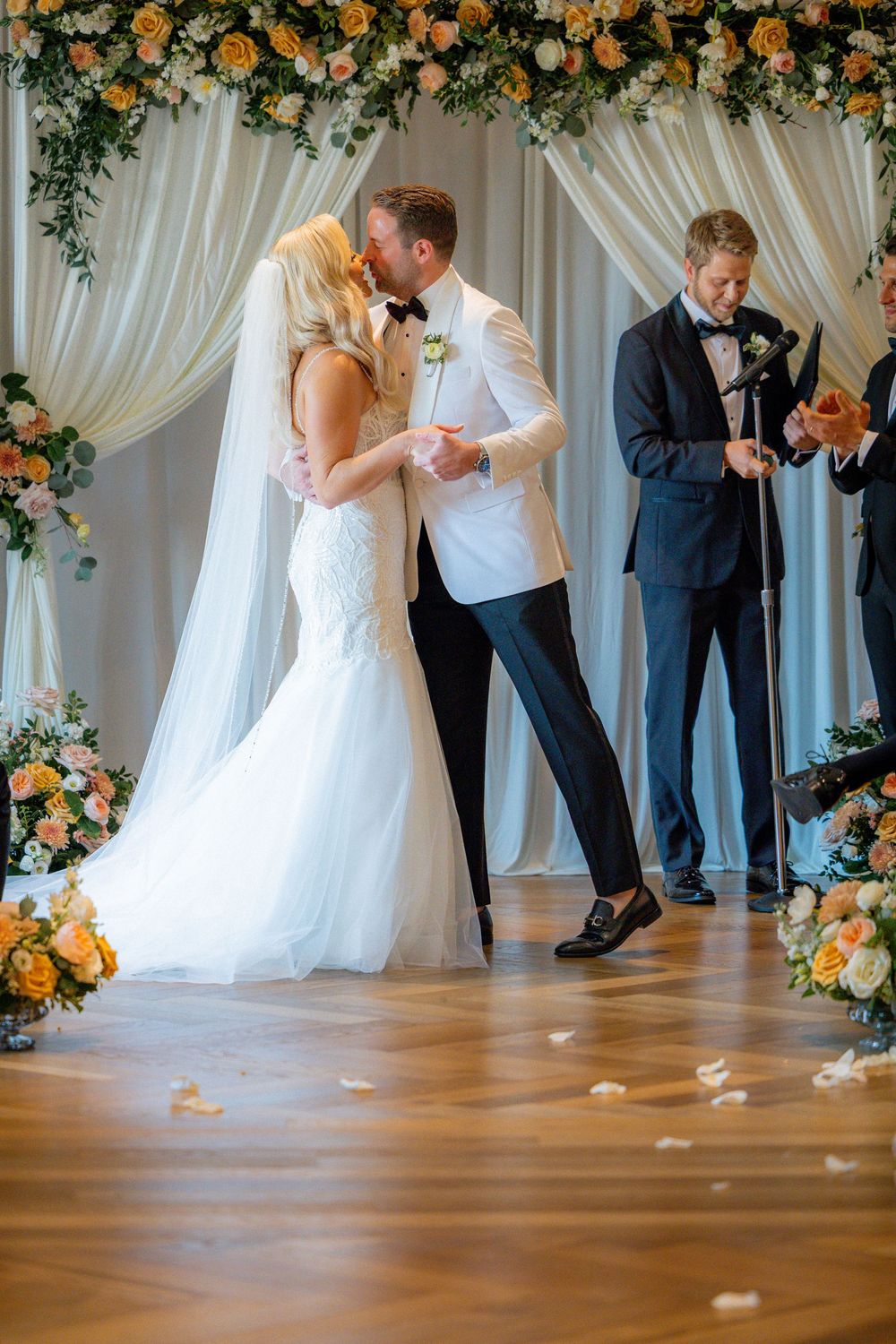 Wedding reception details at Book Tower Detroit with elegant table settings and city skyline views.
