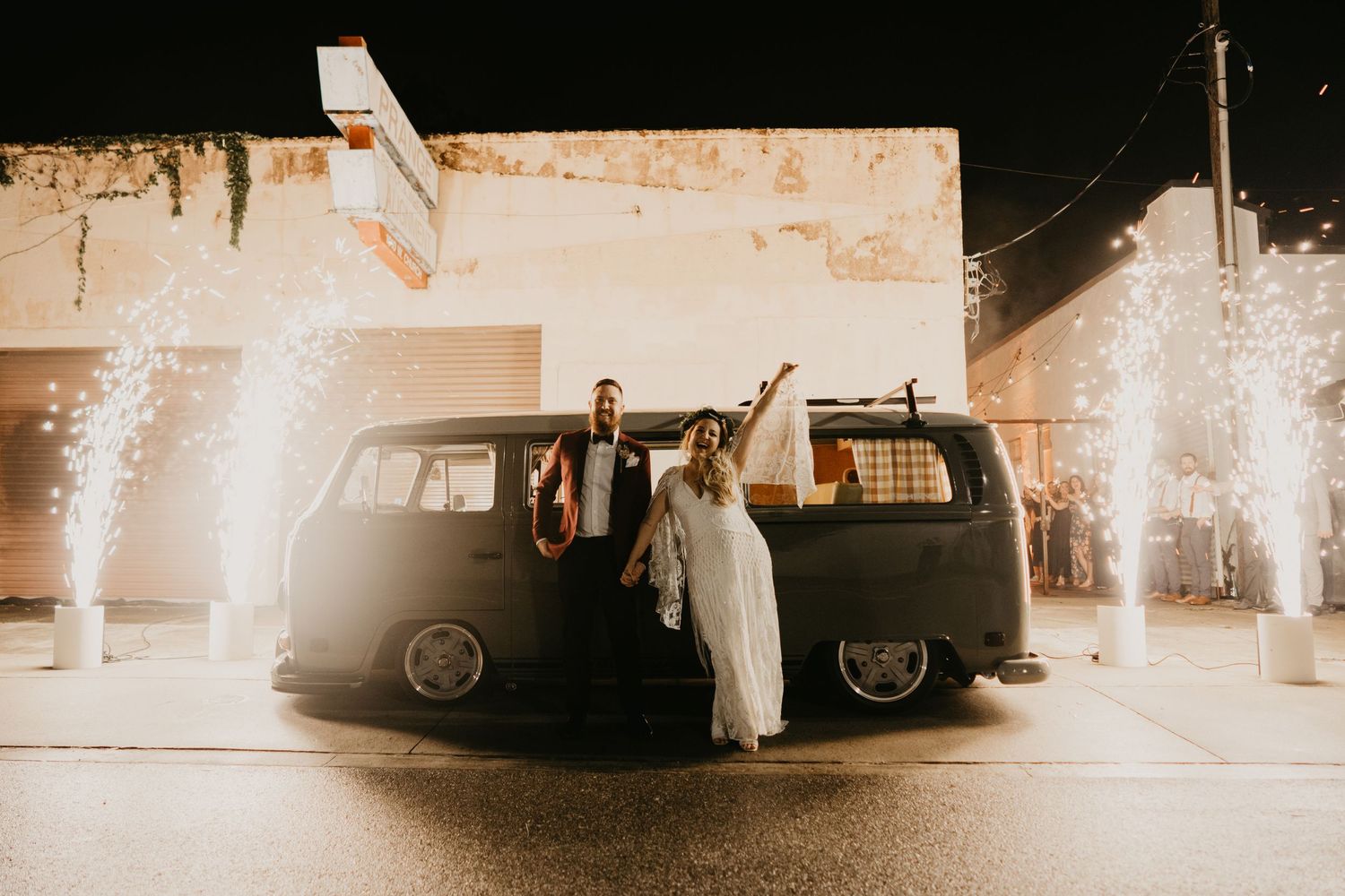 Alexis & Brian Stuart at 1010 West on their wedding night, celebrating in front a vintage VW Bus with Cold Sparks. Cred: The Roots & Stones