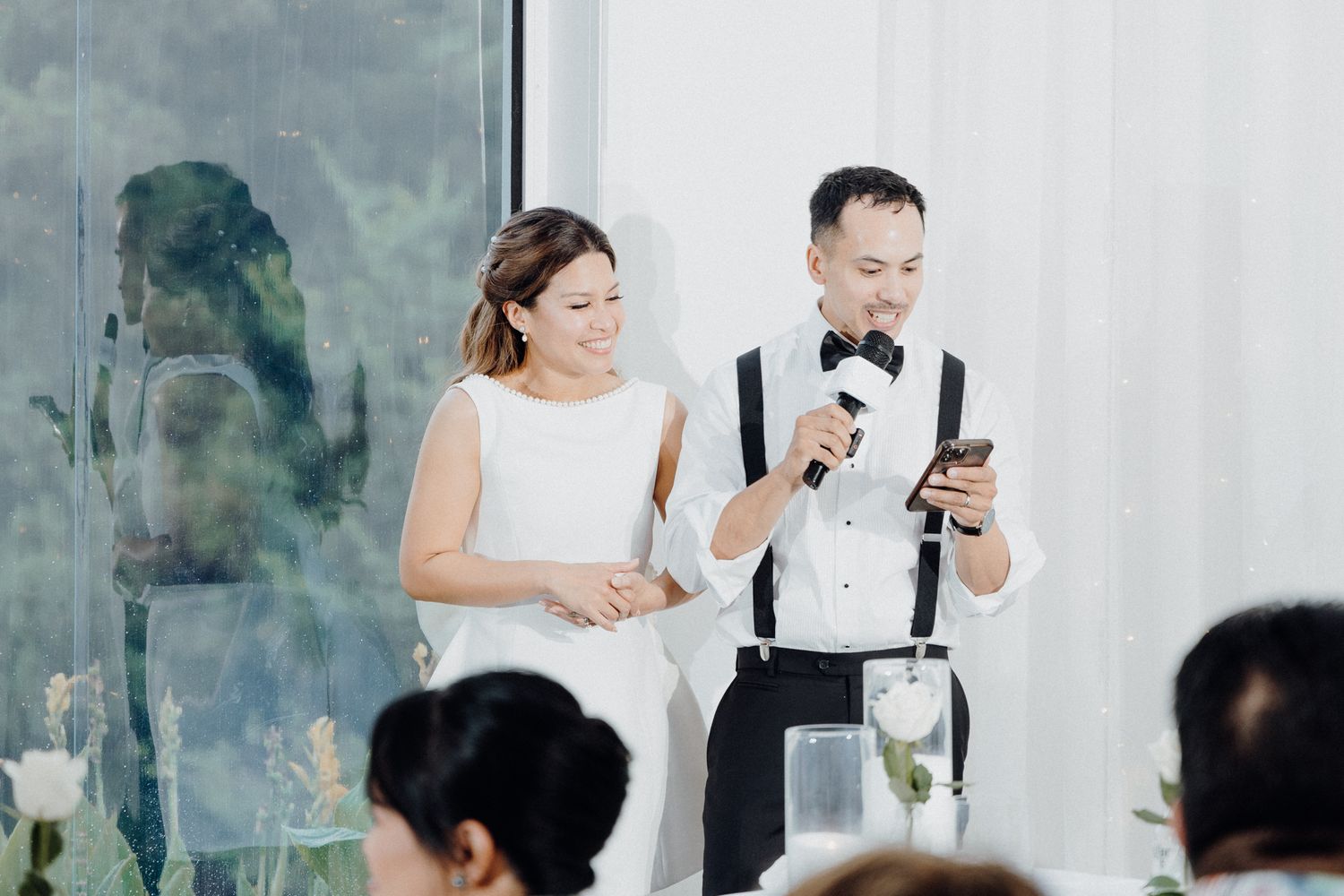 A couple gives heartfelt wedding speeches captured by Apertured Media Auckland Wedding Photographer.