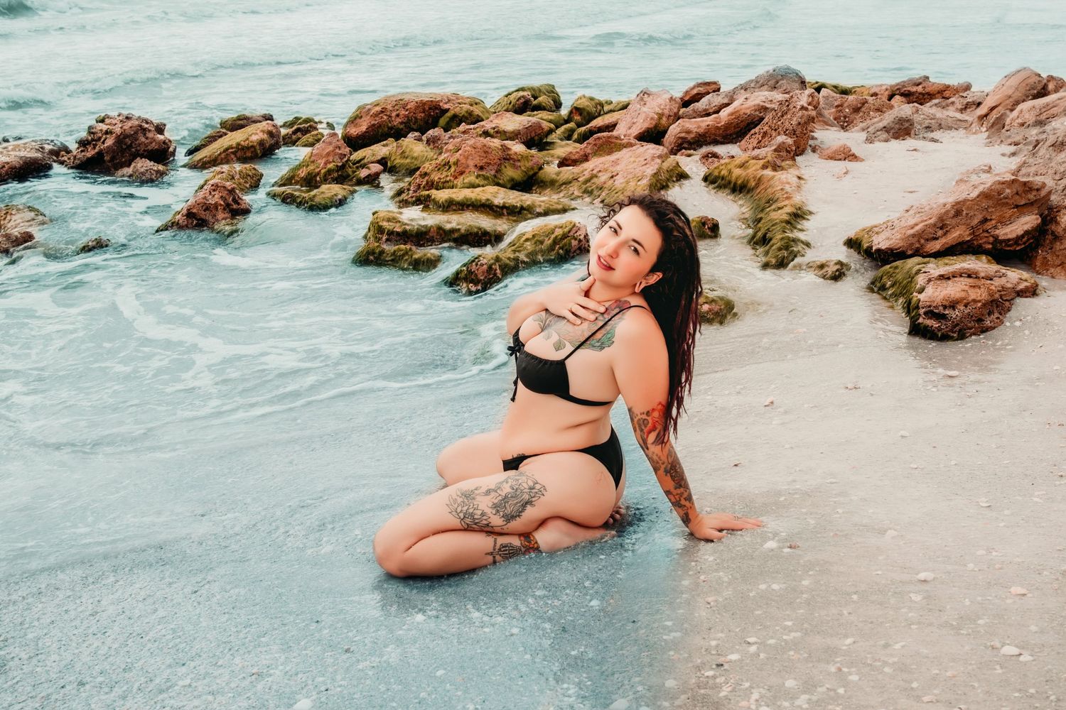 Sunset boudoir photo of curvy, inked woman on Siesta Key Beach | Empowering coastal session in Florida