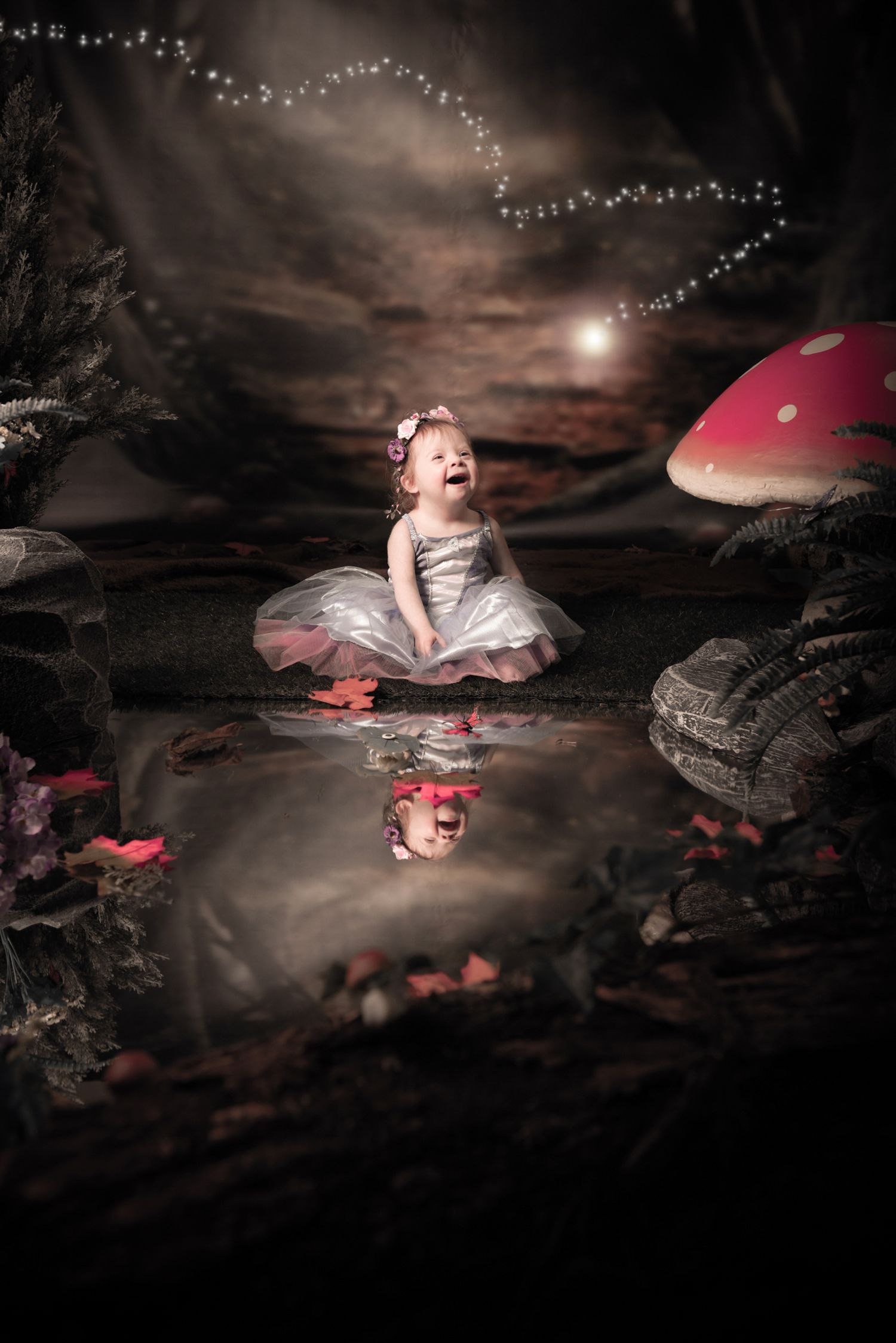 Magical fairy tale scene with red mushrooms and twinkling lights reflecting in a dark pond at night.