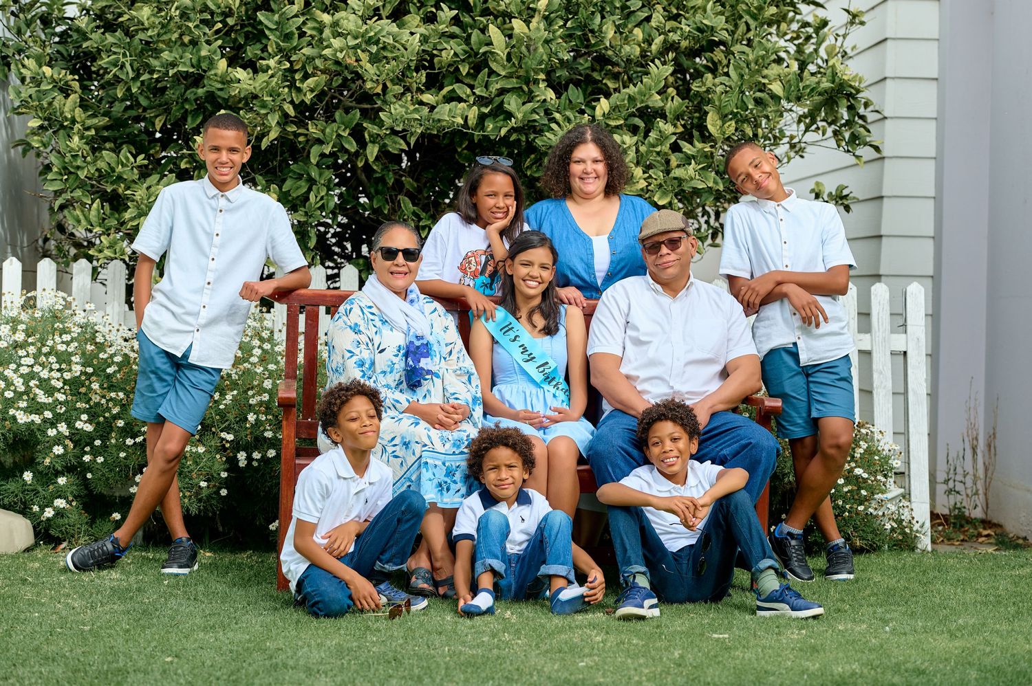family wearing denim and white seating