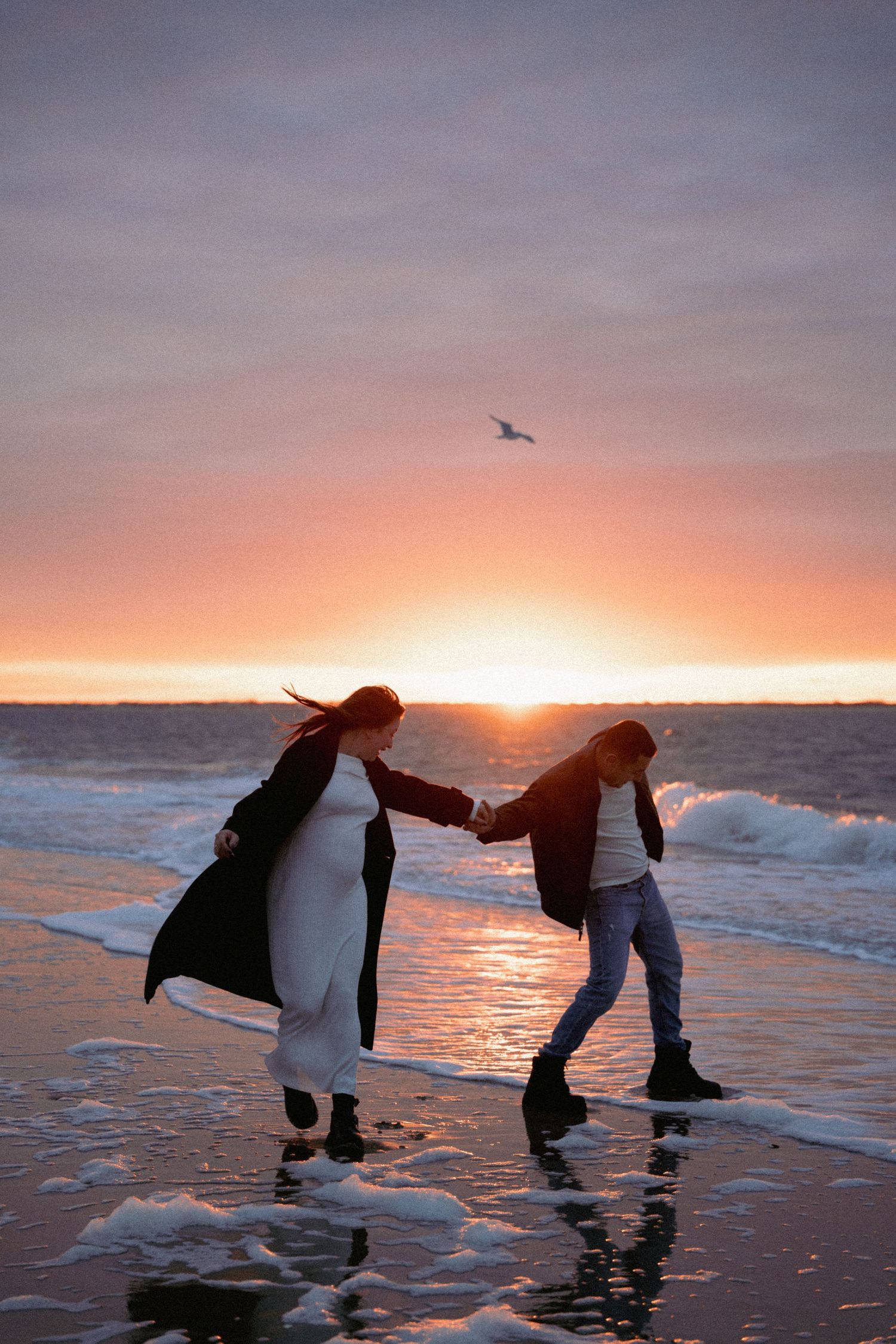 Emotional and breathtaking couple photoshoot by the ocean, capturing deep connection, movement, and raw beauty maternity