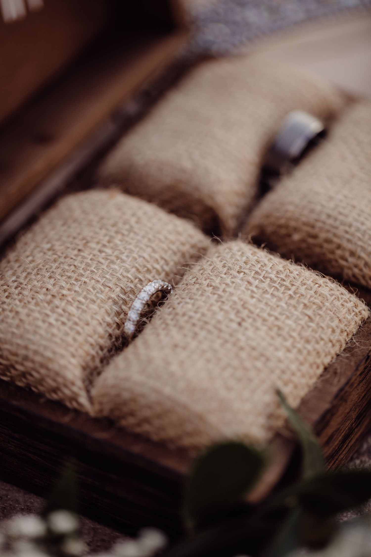 A closeup view of vintage book pages with weathered brown textures and worn edges.