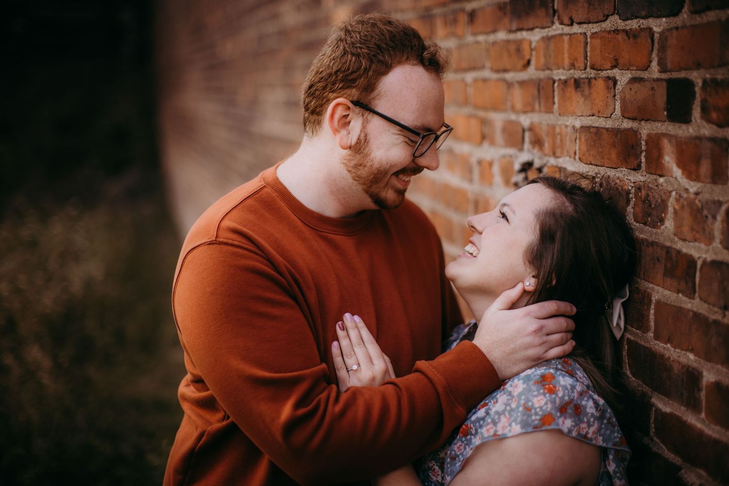 A series of romantic moments unfolds during a sunset engagement photoshoot.