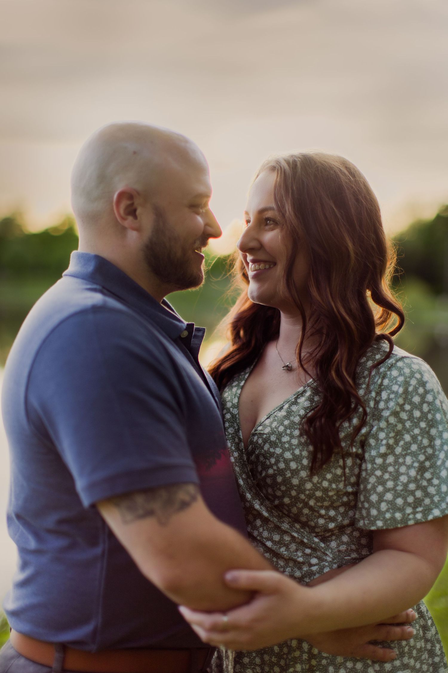Candid sequence showing a couple laughing and embracing during a sunset photo session.