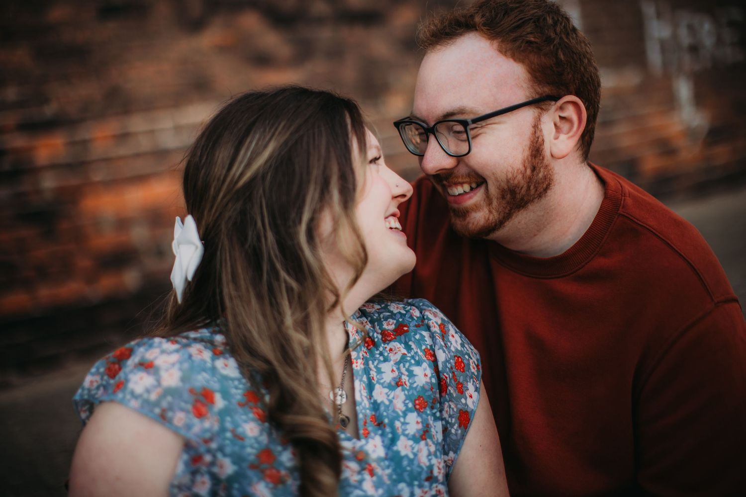 A candid moment between a couple during their engagement session.