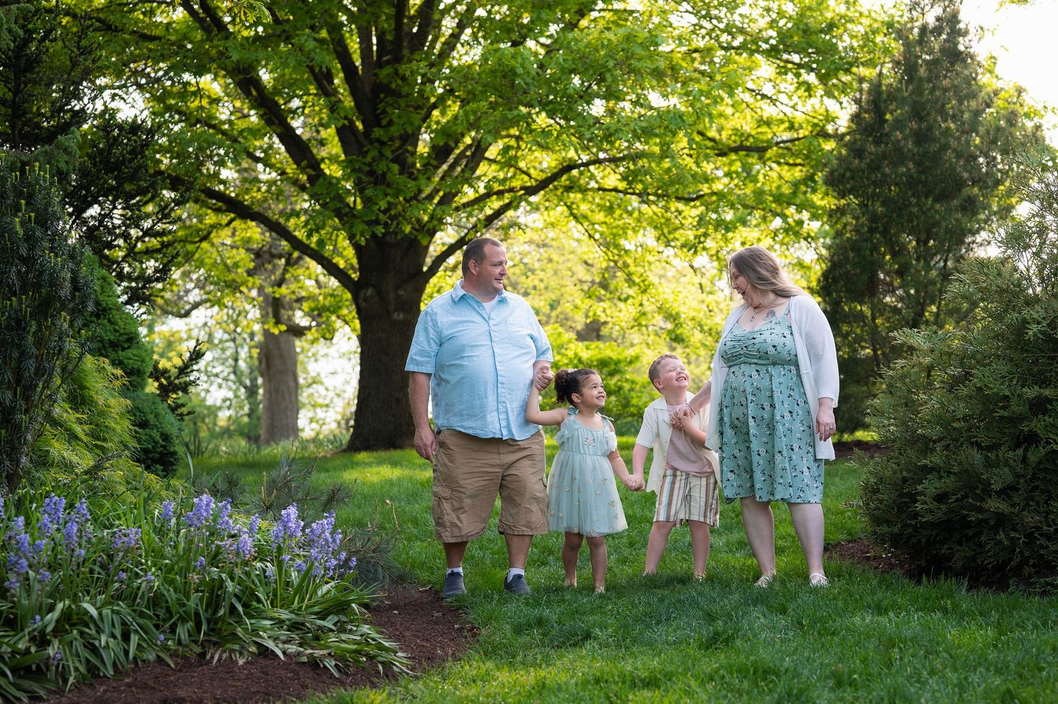 Franklin Park family session with barefoot toddlers and joyful hugs
