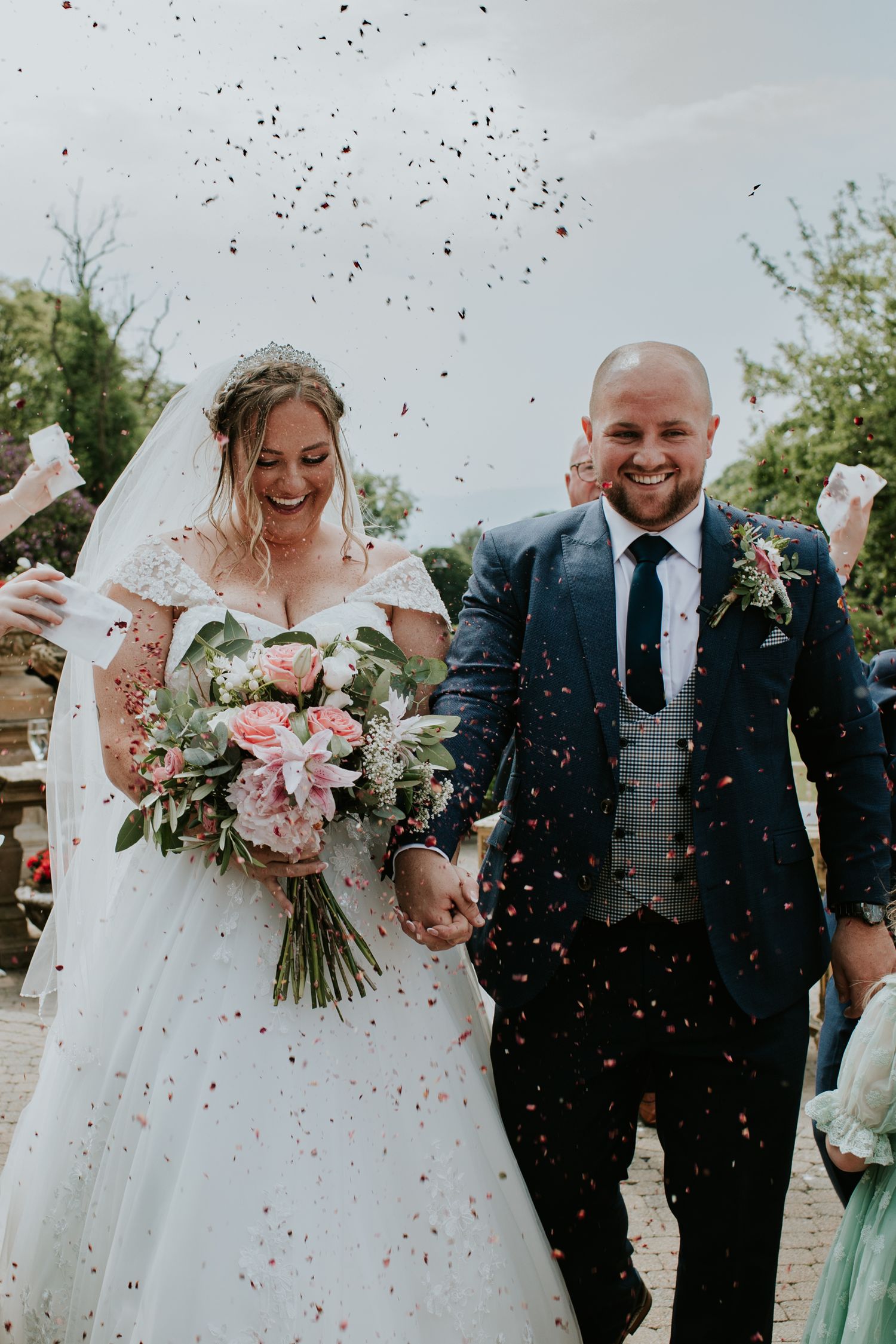 Bride and groom walk down the aisle at the Culloden Estate and Spa