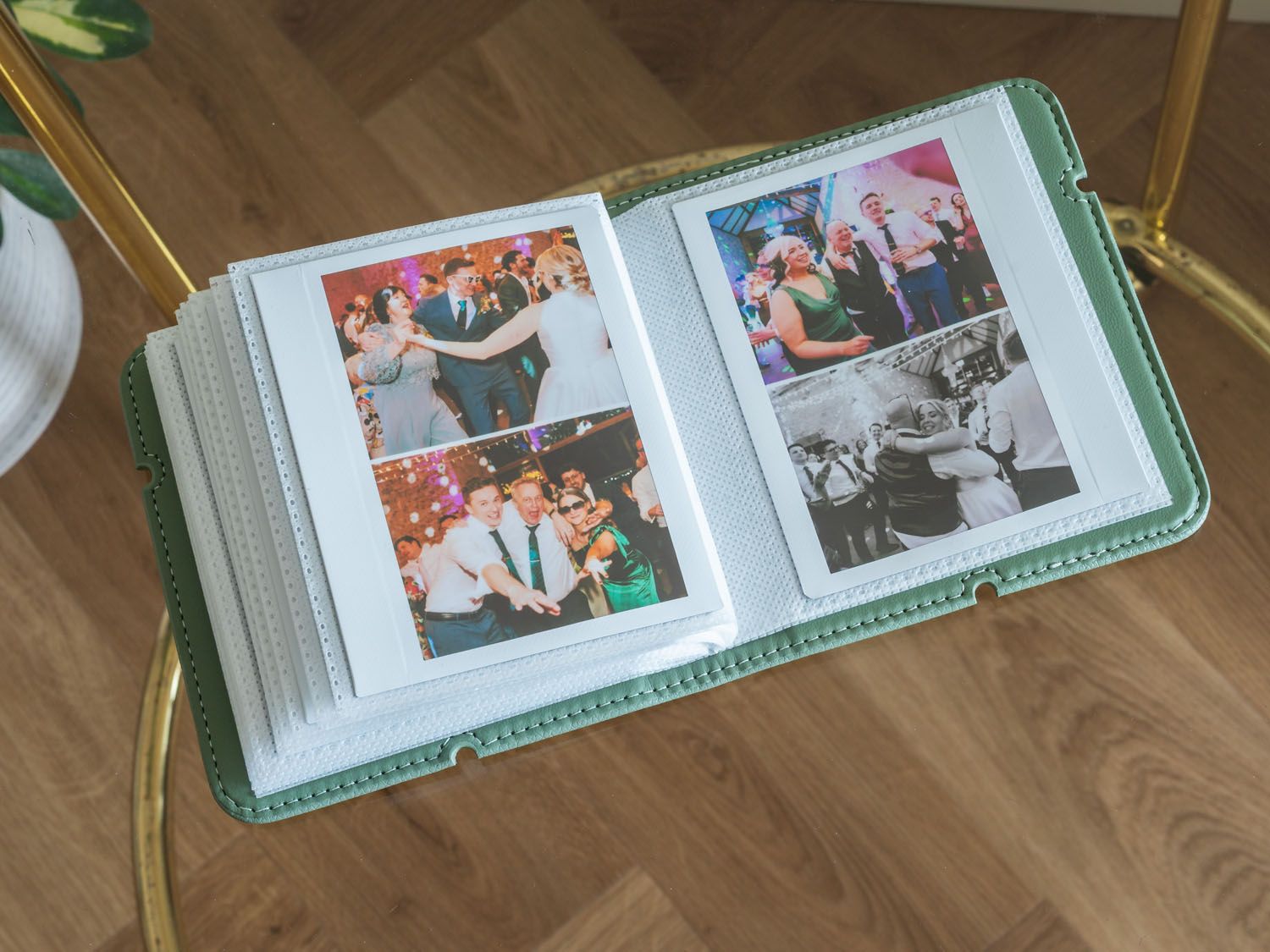 Photo album spread showing multiple reception party snapshots and candid moments.