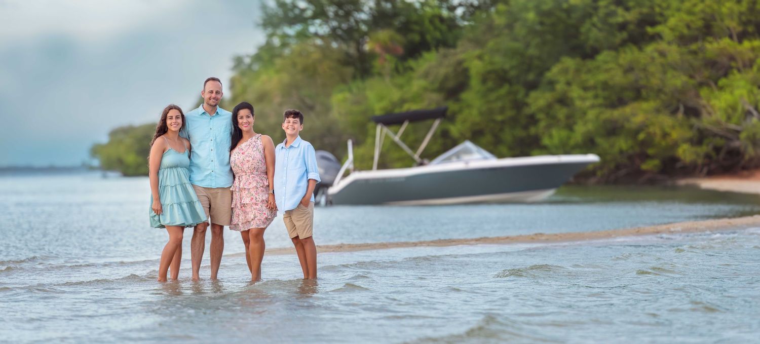 Satellite Beach Family portrait on the water on the Banana River in the summer