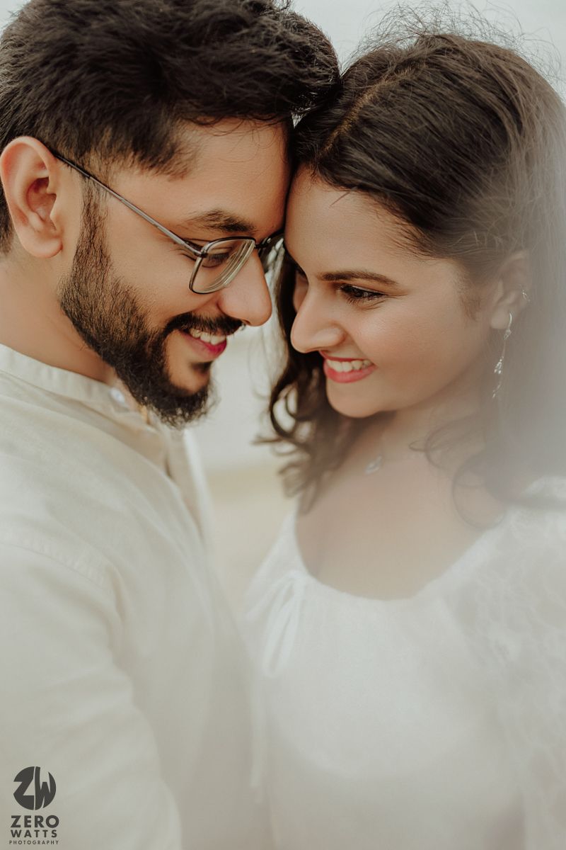 Intimate couple portrait series in dreamy white tones.