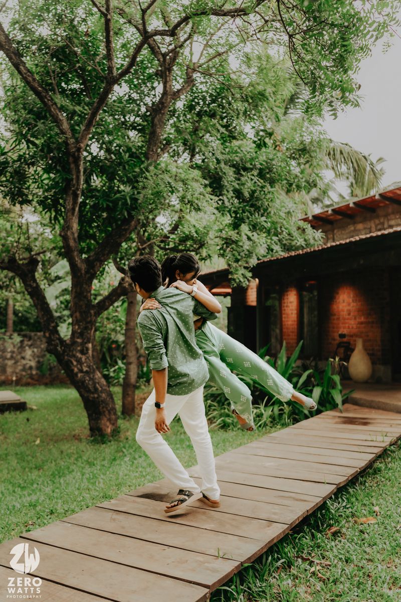 Five action shots show someone falling backwards onto wooden decking in a lush green garden setting.