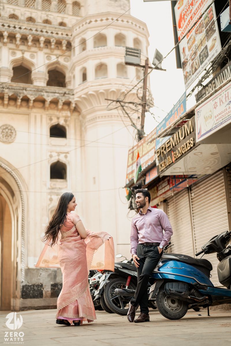 Romantic photoshoot series against white architecture backdrop featuring pink dress and playful poses.