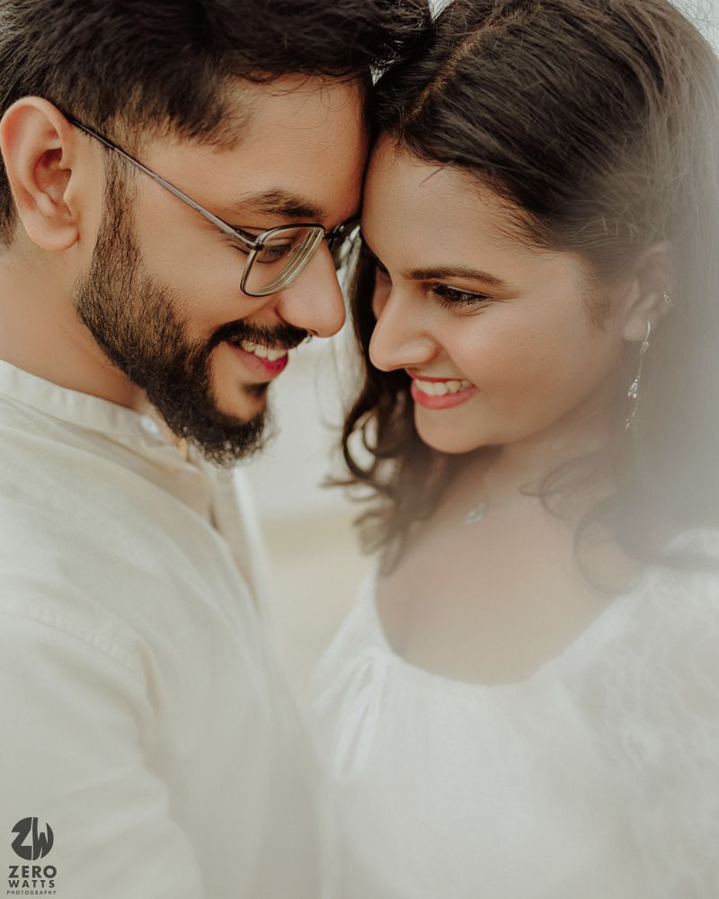 An intimate close-up portrait of a couple sharing a tender moment together.