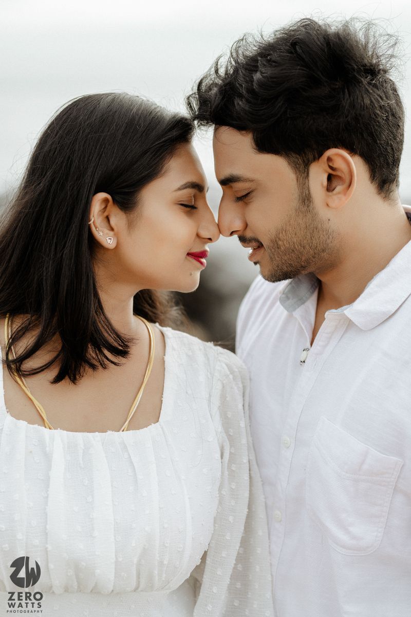 Romantic couple in white clothing share intimate close-up moments across a collection of four tender portrait photos.