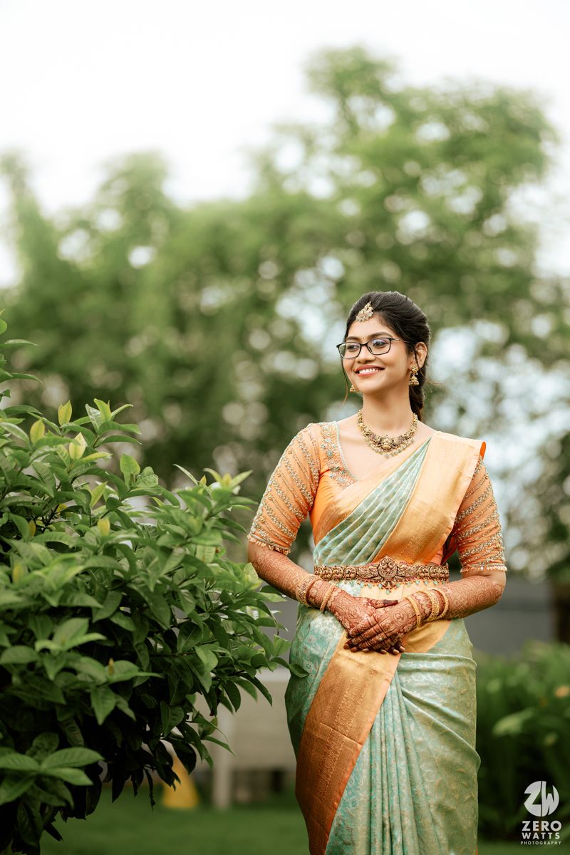 A collage showing a person in traditional mint green and orange saree posing gracefully against a lush garden background.