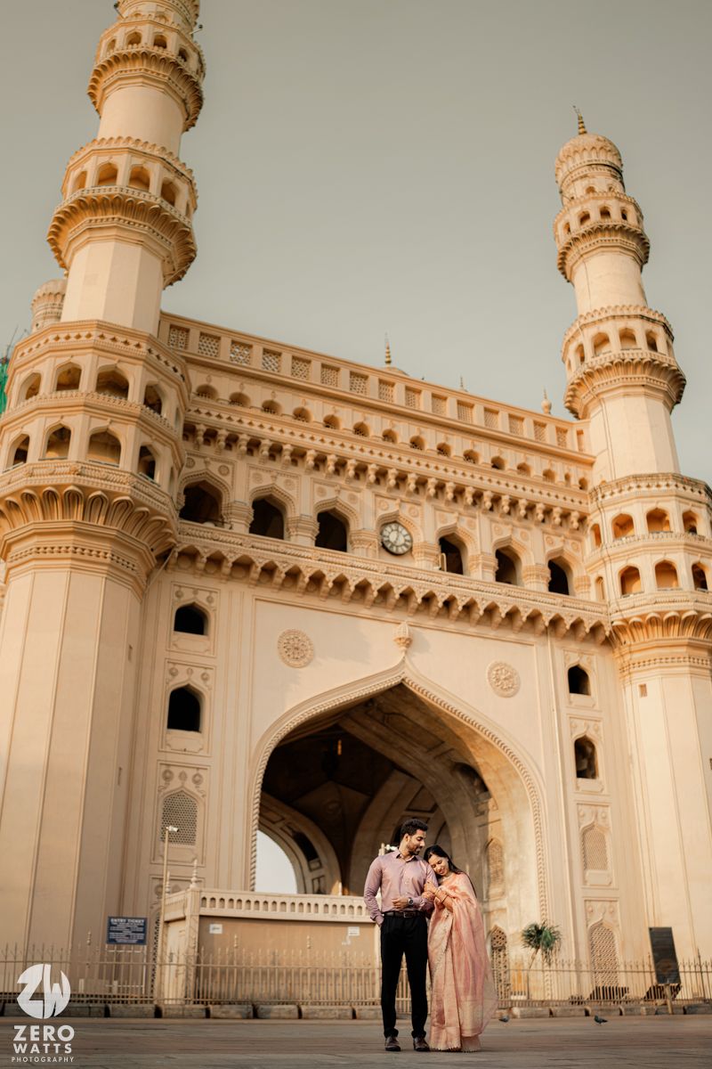 A romantic photoshoot in front of the iconic Charminar monument in Hyderabad.