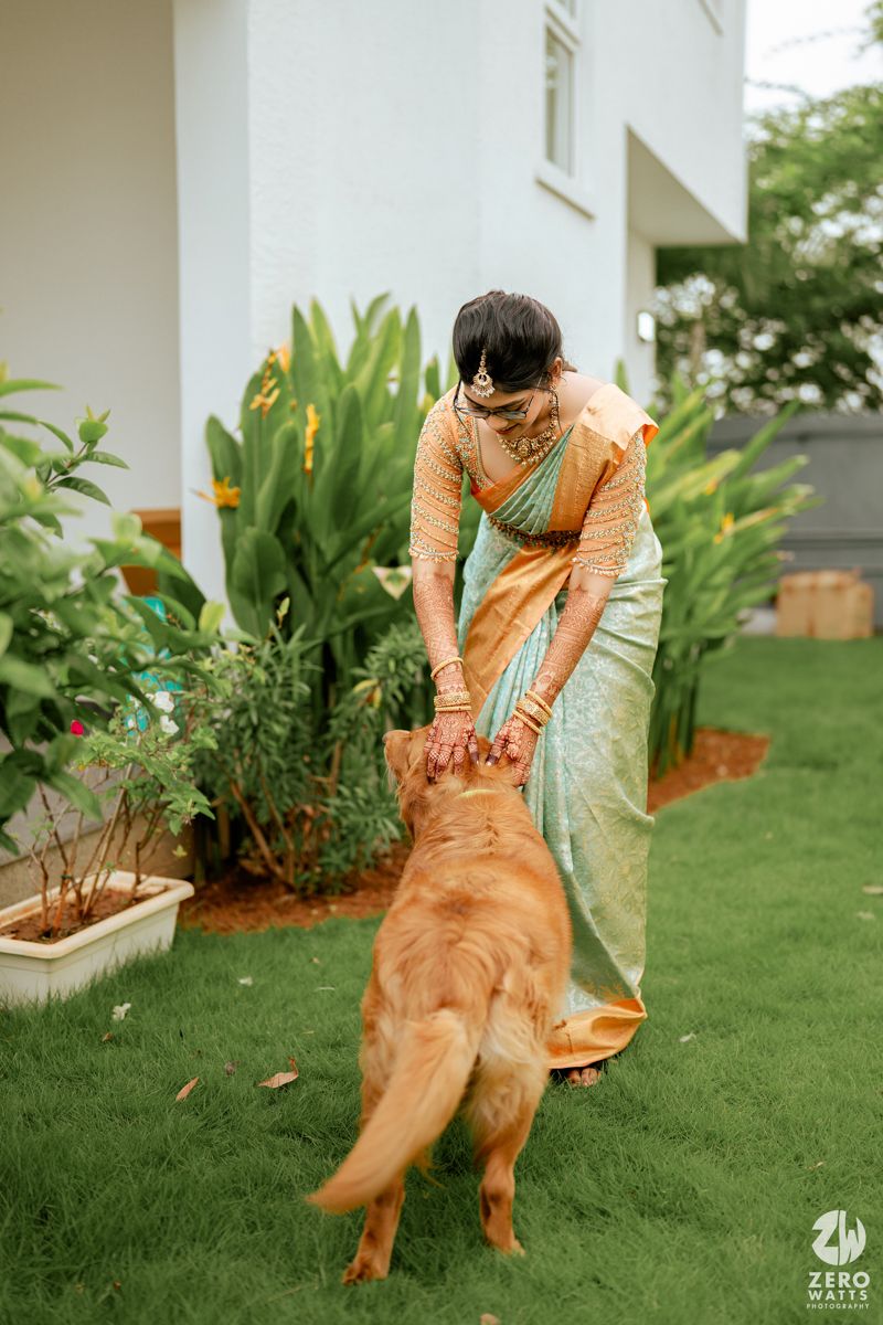 A sequence of candid shots showing someone wearing an orange dress and mint green shawl dancing playfully in a garden setting.