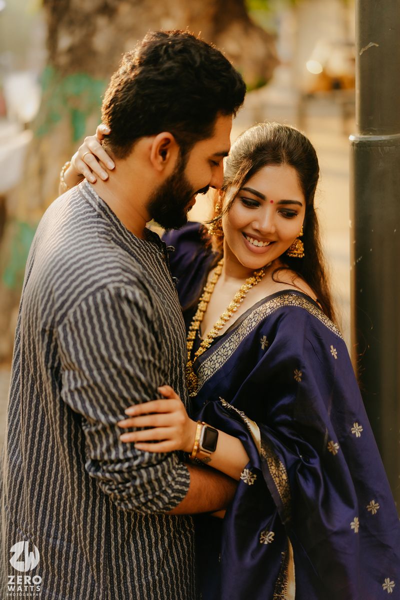A couple in traditional attire sharing intimate moments in a photo series against a blurred background.