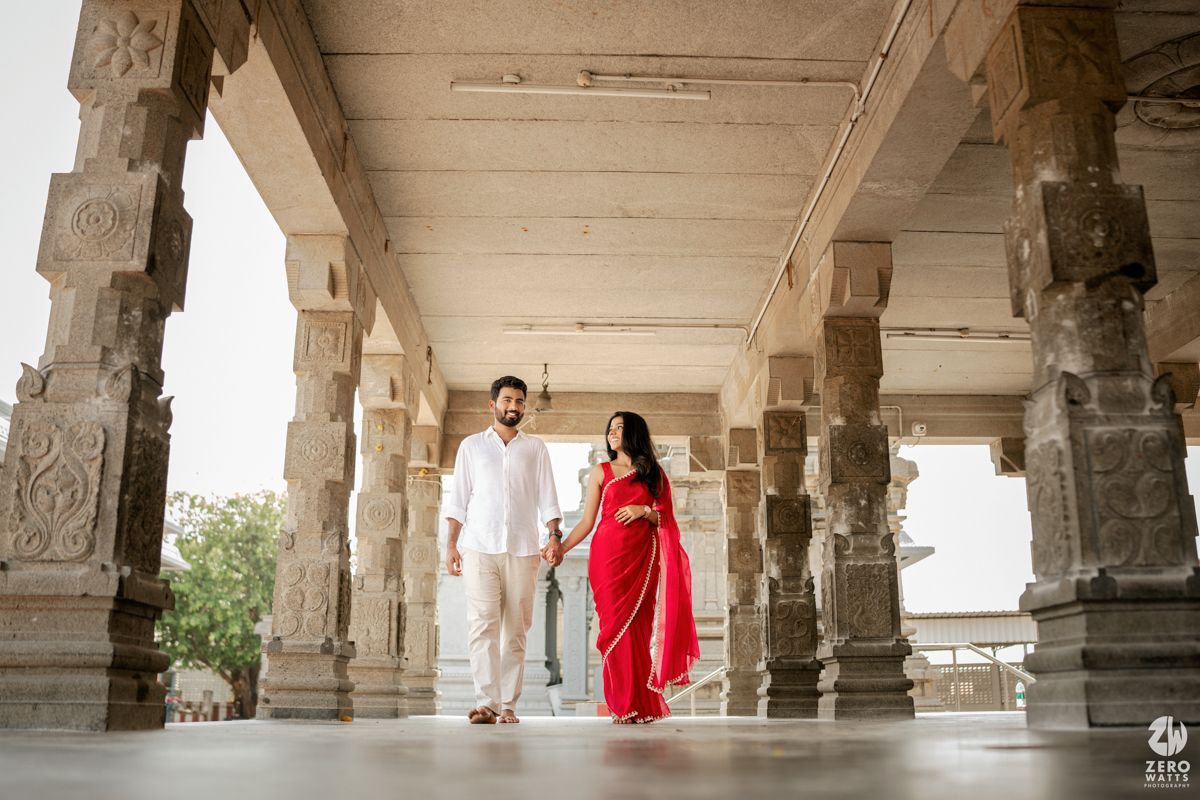 Stone pillared hall showing traditional South Indian temple architecture with natural lighting.