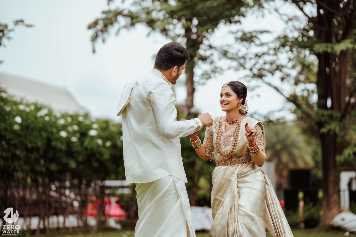 Traditional wedding photoshoot in an outdoor garden setting.