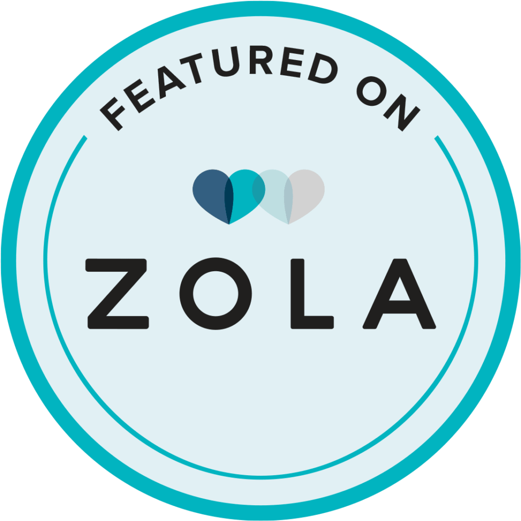 A set of four blue and white oval badge designs featuring the wording 'Featured on Zola' in a simple modern style.