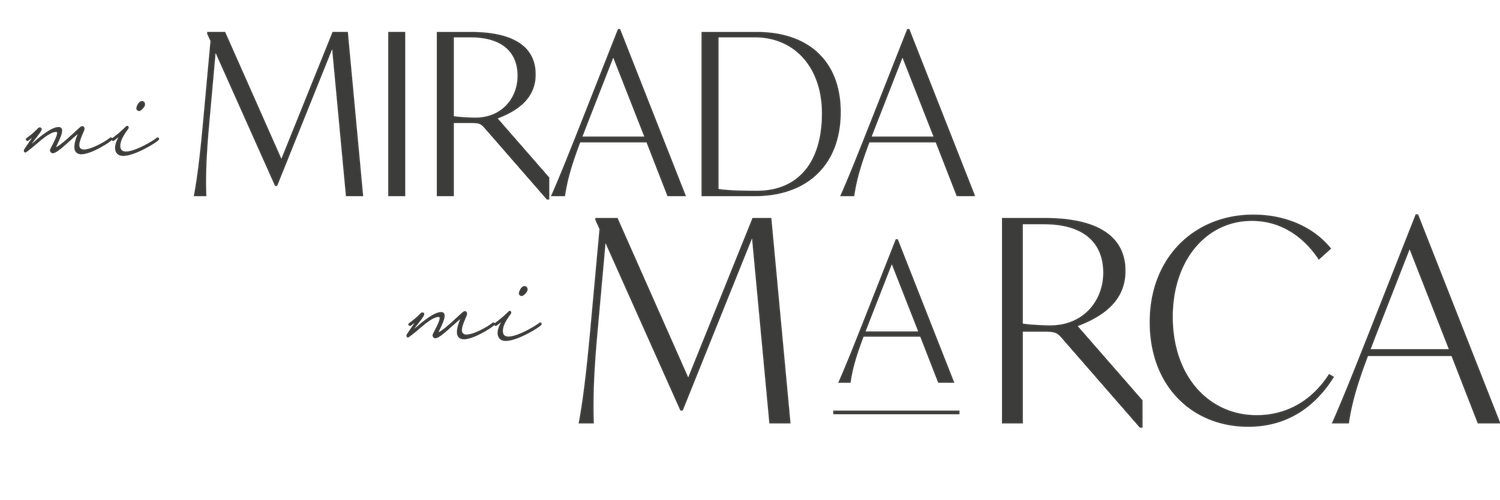 Stylized text reading 'Mi Mirada Mi Marca' on dark background.