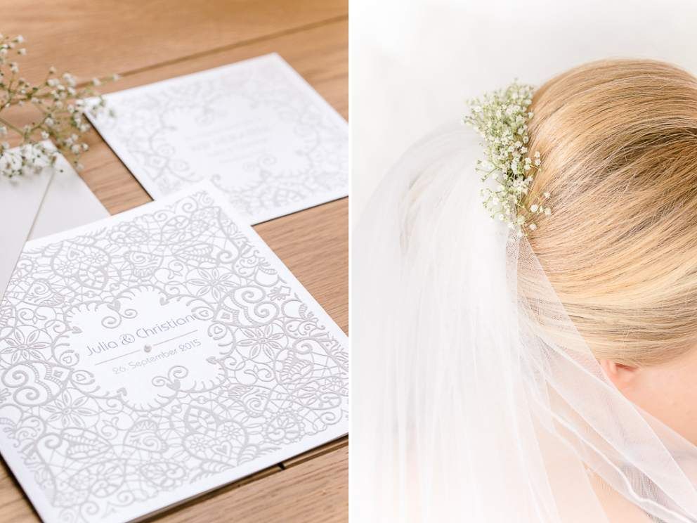 Hochzeitseinladung und Braut-Haarschmuck aus echten Blumen am Schleier befestigt