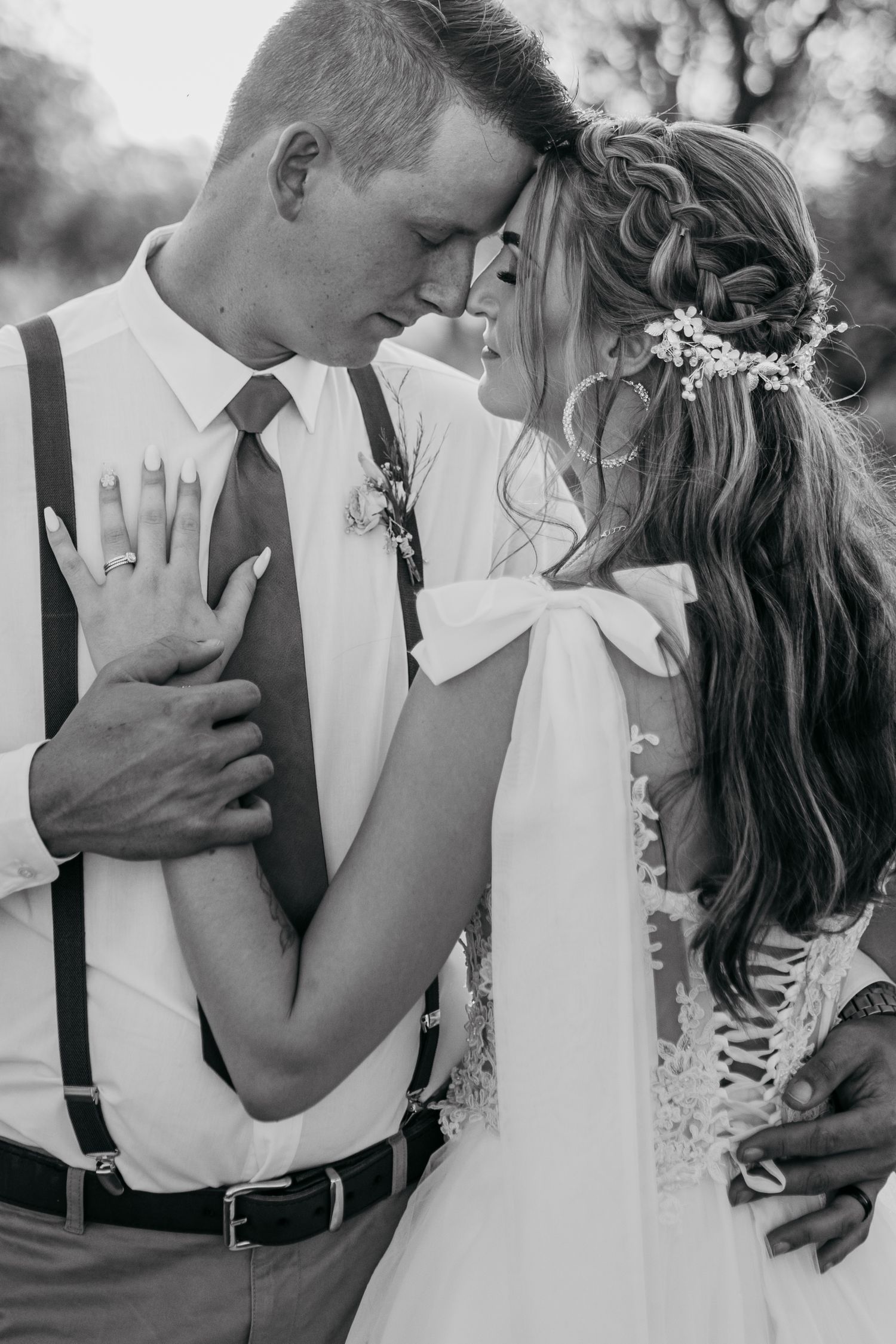 Intimate black and white portrait showcasing romantic wedding moment.