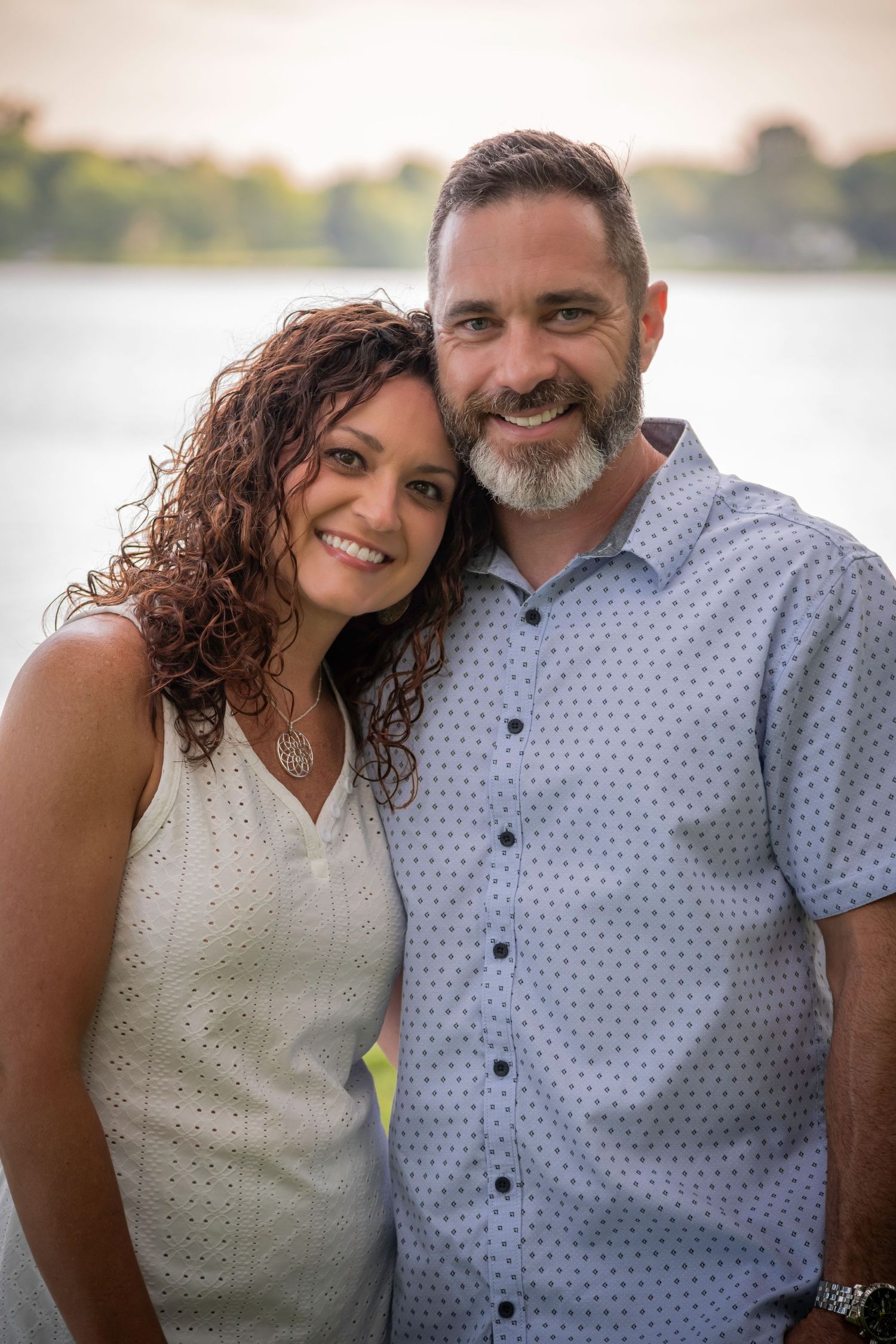 Wife and husband portrait in the summertime by the lake, Cumberland River, Tennessee.