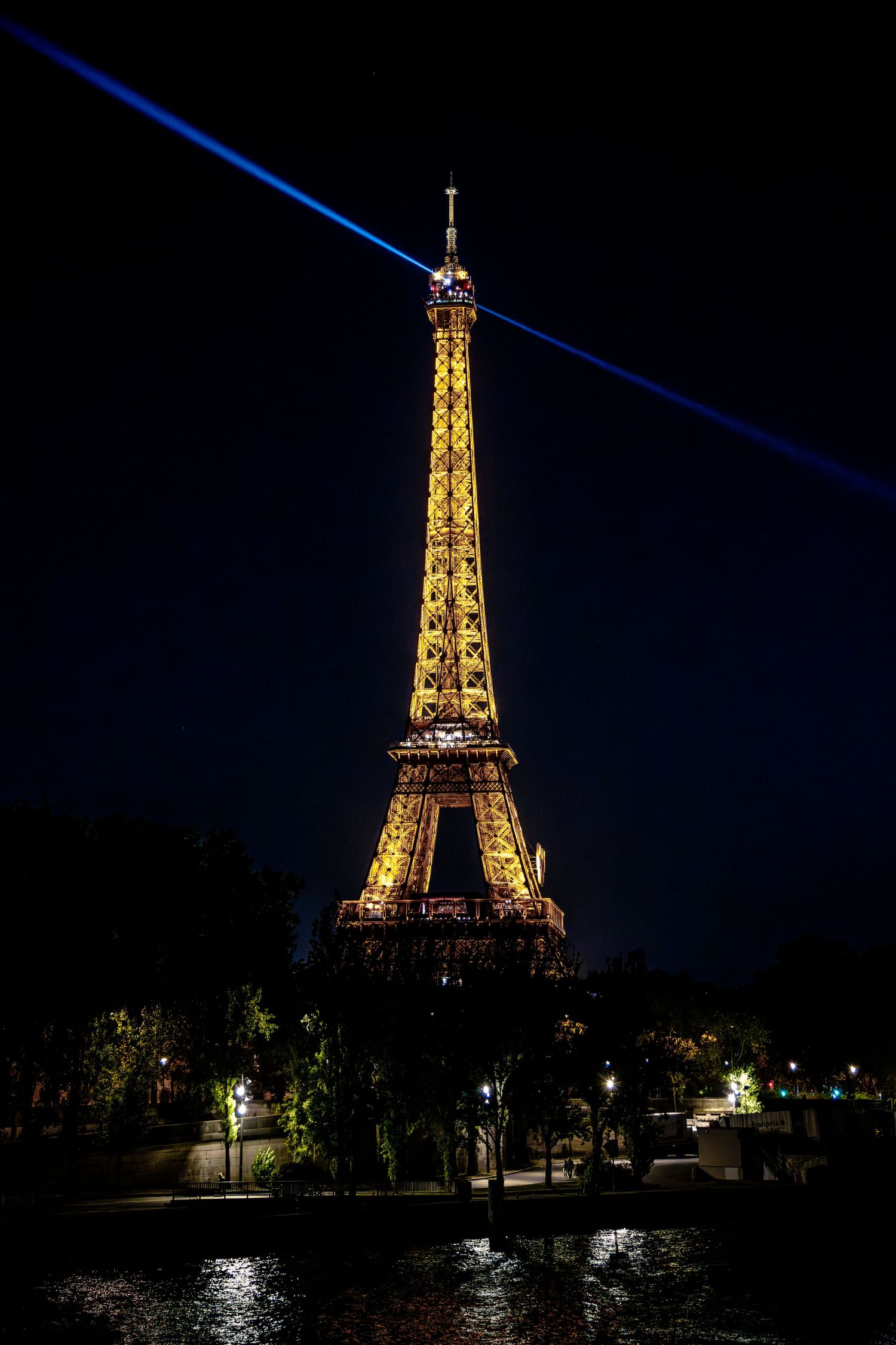 The Eiffel Tower lights up the Paris skyline; destination weddings & lifestyle sessions are available worldwide! Connect with us today!