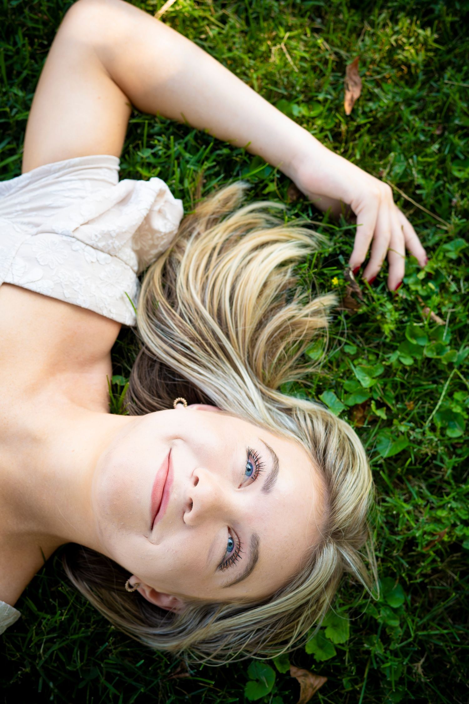 Fresh faced and happy girl, spring and summer green grass, true-to-color: custom lifestyle session. Robinson Photography