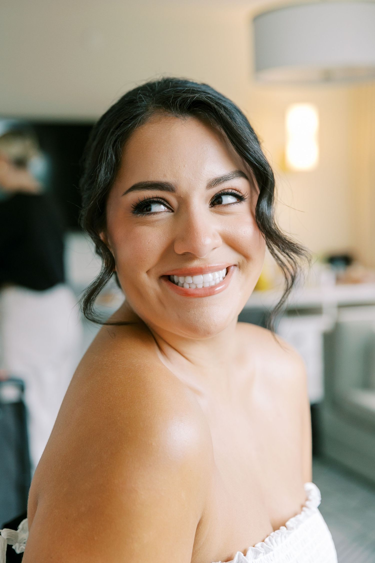 Close up portrait shots showing joyful expressions and genuine smiles in natural indoor lighting.