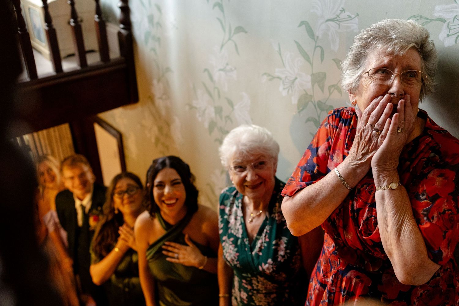 Elderly nursing home residents share joyful laughter while participating in a group activity together.
