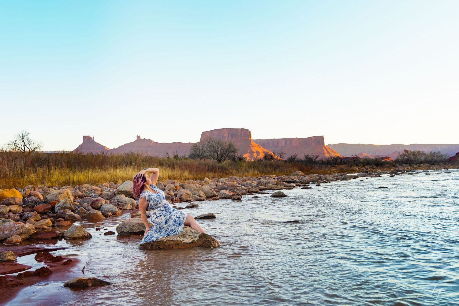 Portrait of a woman in a river in Moab