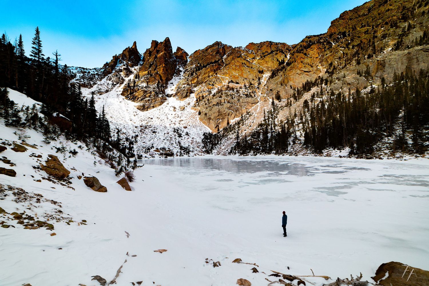 Portrait of a man on frozen lake in Colorado