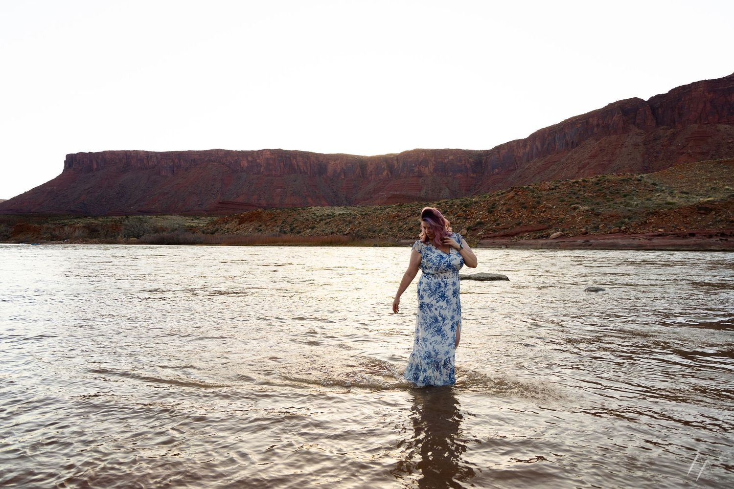 Portrait of a woman in a river in Moab
