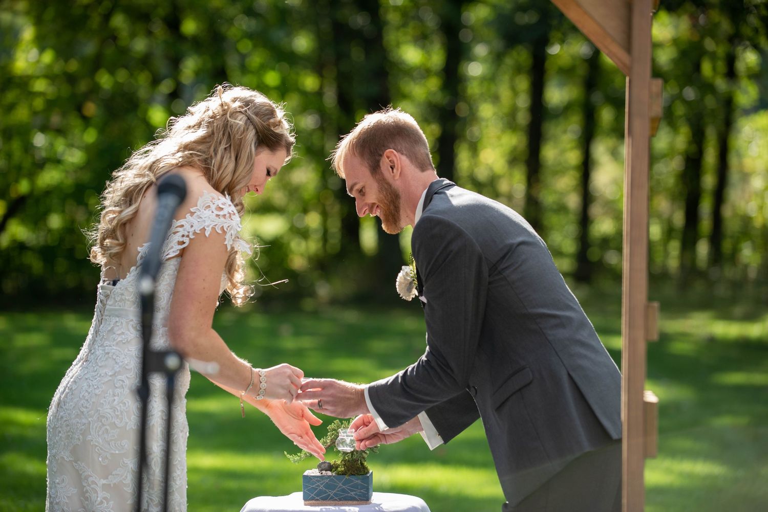A couple shares their first dance during an outdoor wedding reception. Rum River Barn Milaca Minnesota Weddings