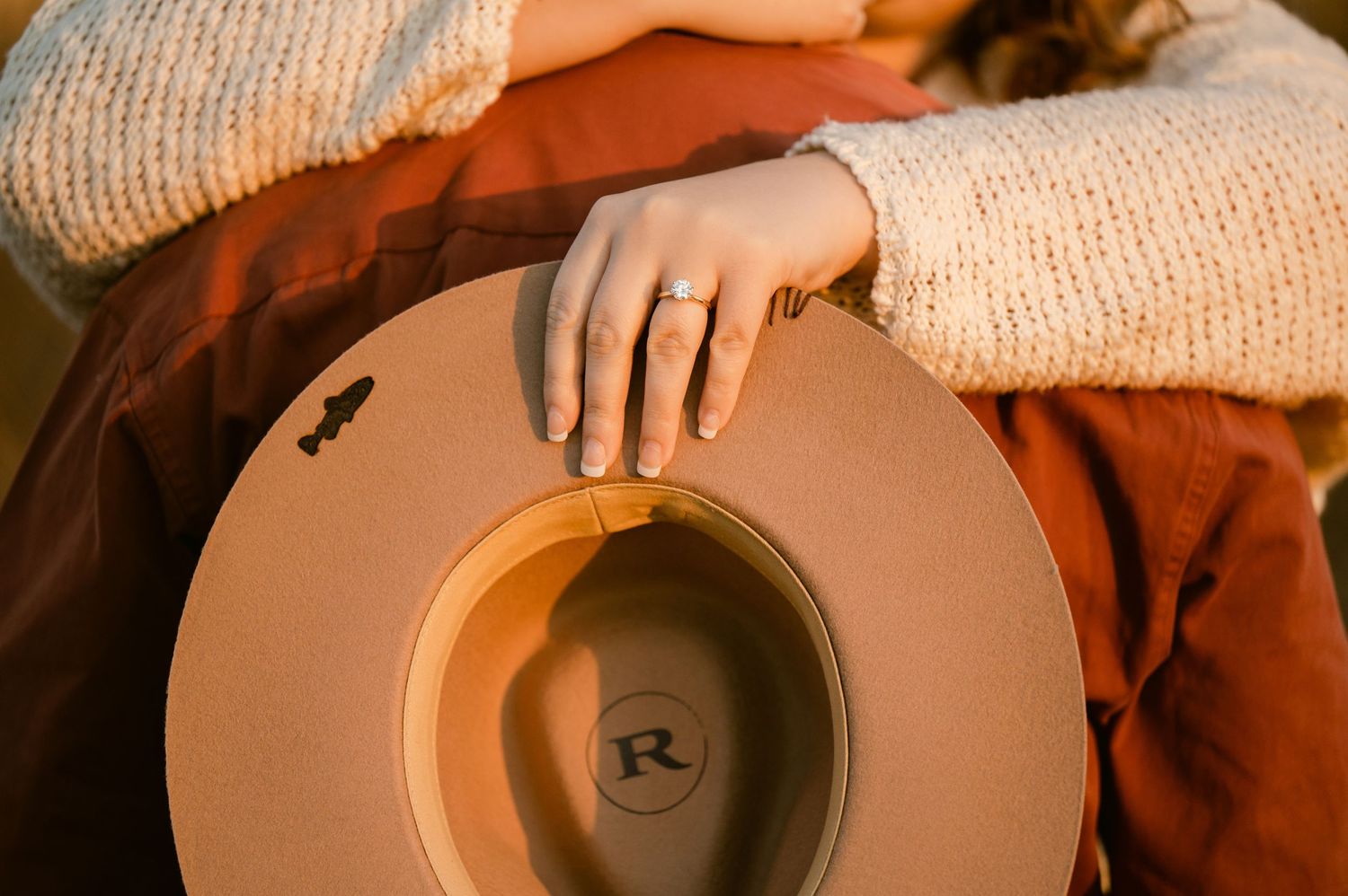 Hands hold a handcrafted ceramic pottery bowl showing the intricate making process in sequential stages.