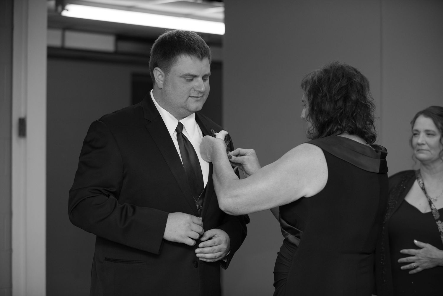 Wedding couple and guests preparing for first dance in reception hall. Andover wedding at Magestic Oaks Golf Club