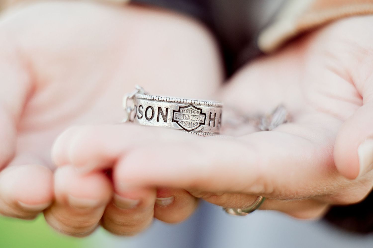 Senior Portrait in Foreston MN Close-up detail shot of hands showing delicate jewelry.
