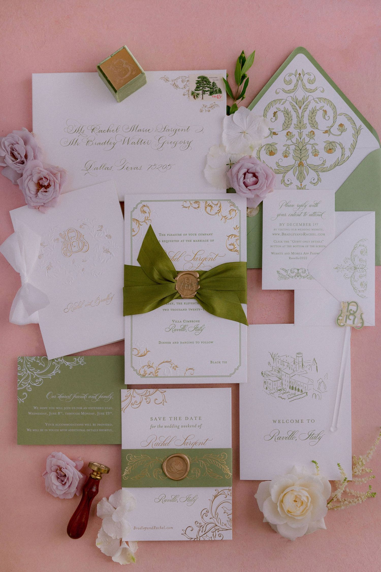 Elegant wedding invitation suite in white and sage green with gold accents, silk bow, and delicate pink roses on pink background.