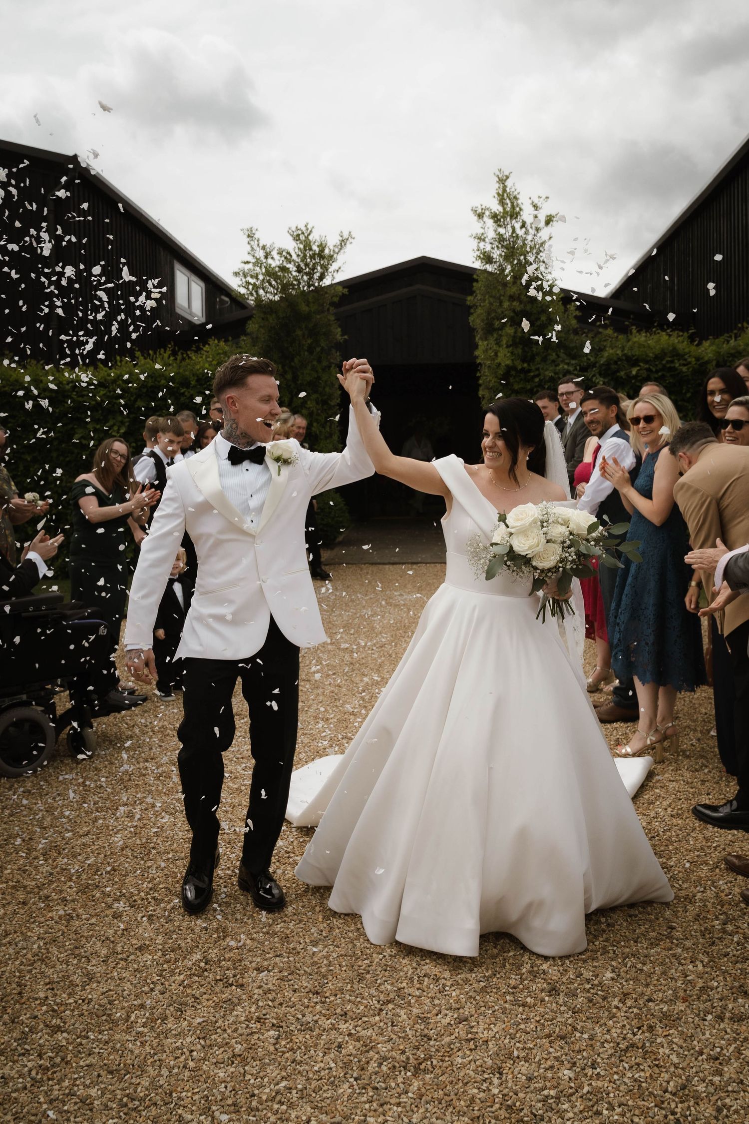 bride and groom confetti photo at Primrose Hill farm Wedding- Photo by Primrose Hill Farm Wedding Photographer, Olivia J Morgan Photography