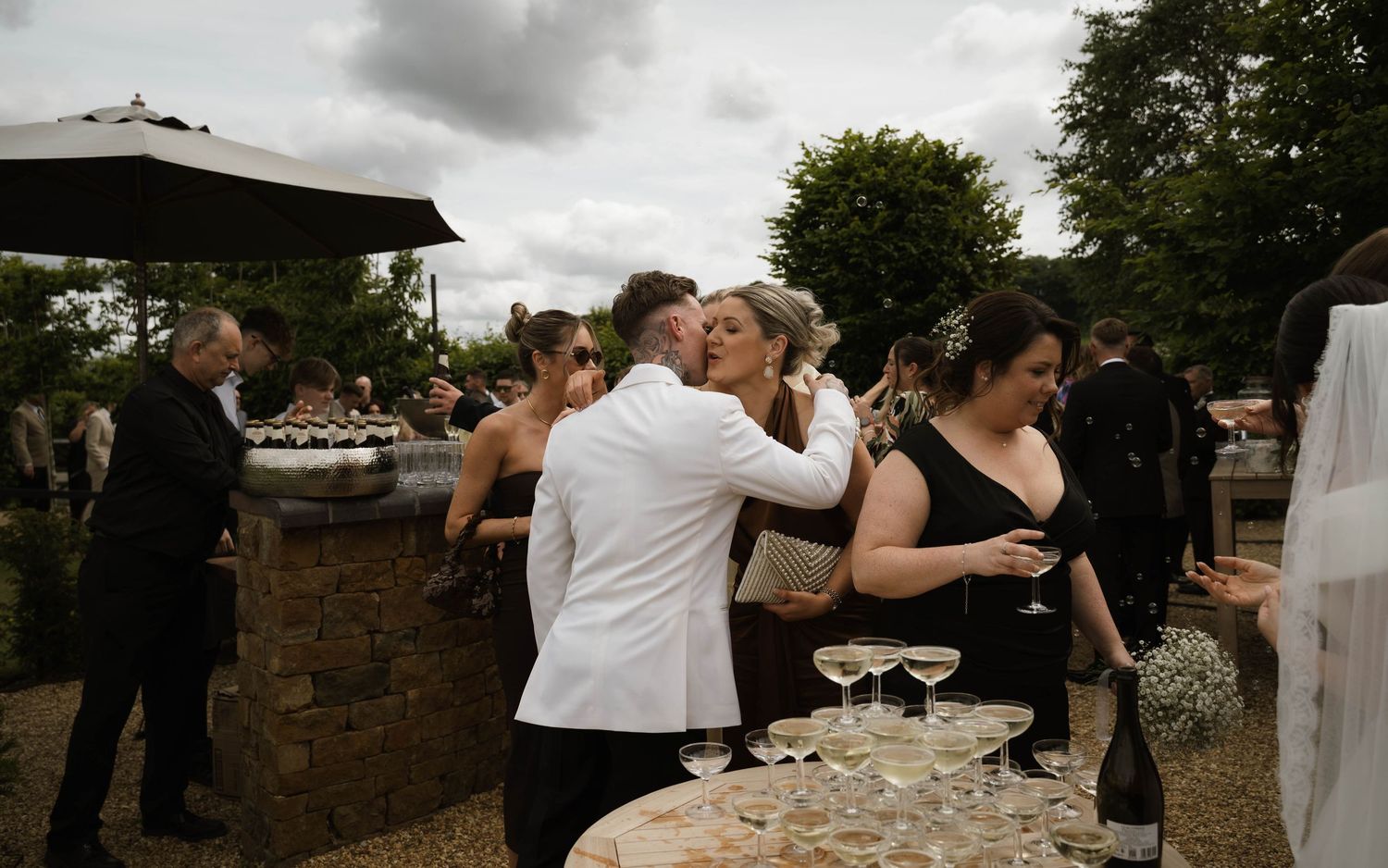 groom welcomes guests at Primrose Hill farm Wedding- Photo by Primrose Hill Farm Wedding Photographer, Olivia J Morgan Photography