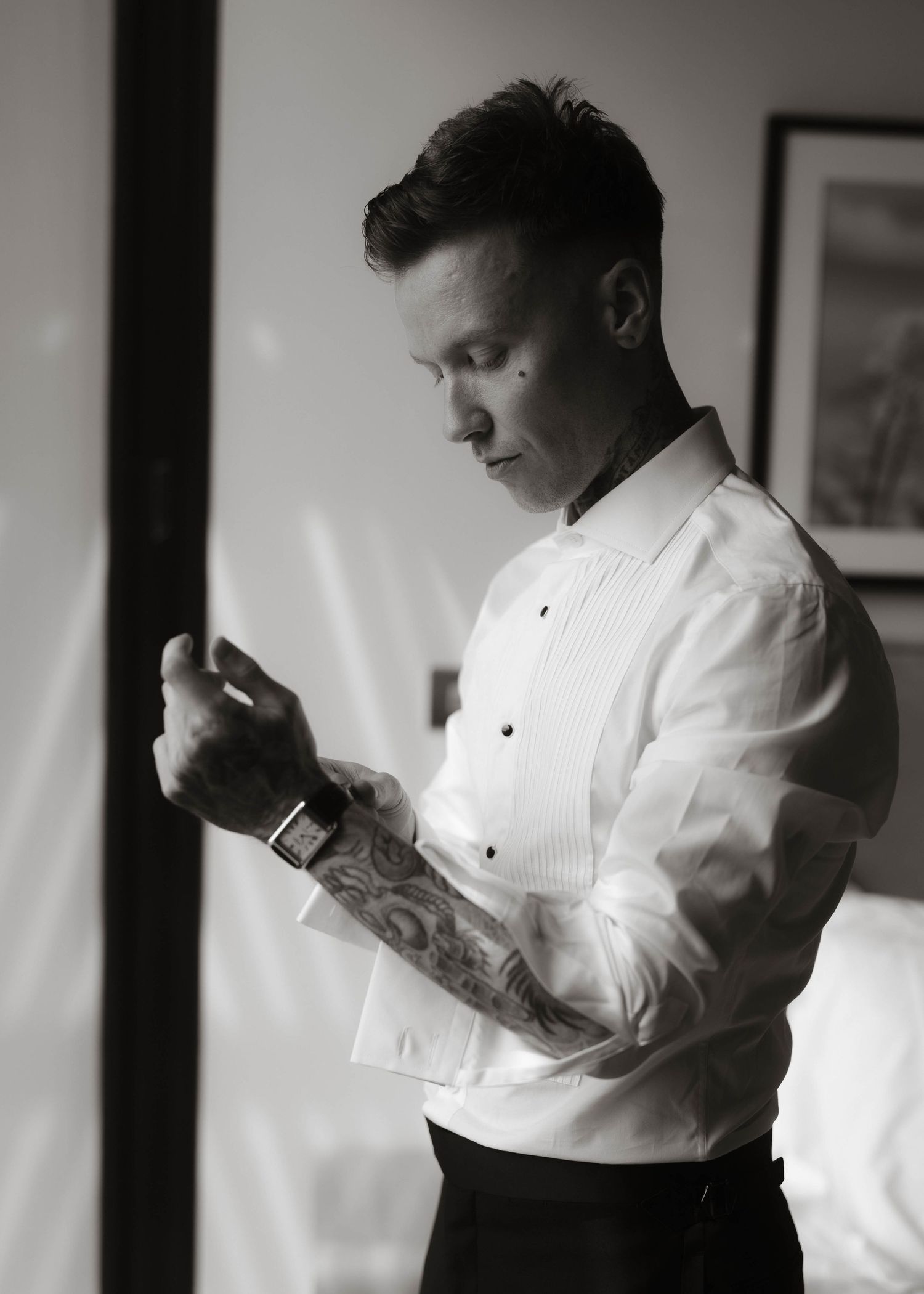 groom does his cufflinks at Primrose Hill farm Wedding- Photo by Primrose Hill Farm Wedding Photographer, Olivia J Morgan Photography