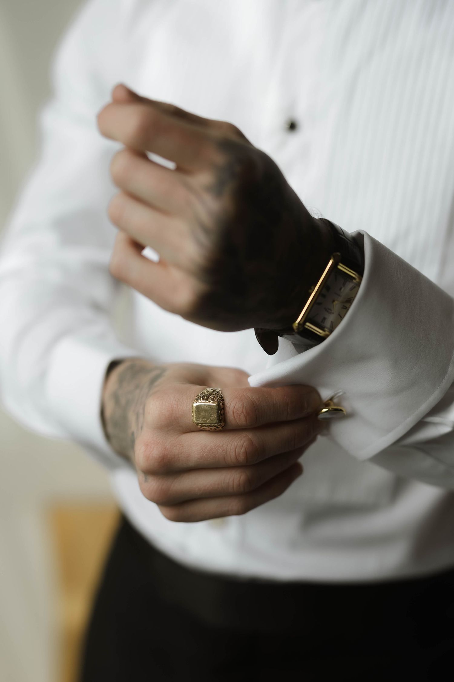 groom does cufflinks at Primrose Hill farm Wedding- Photo by Primrose Hill Farm Wedding Photographer, Olivia J Morgan Photography
