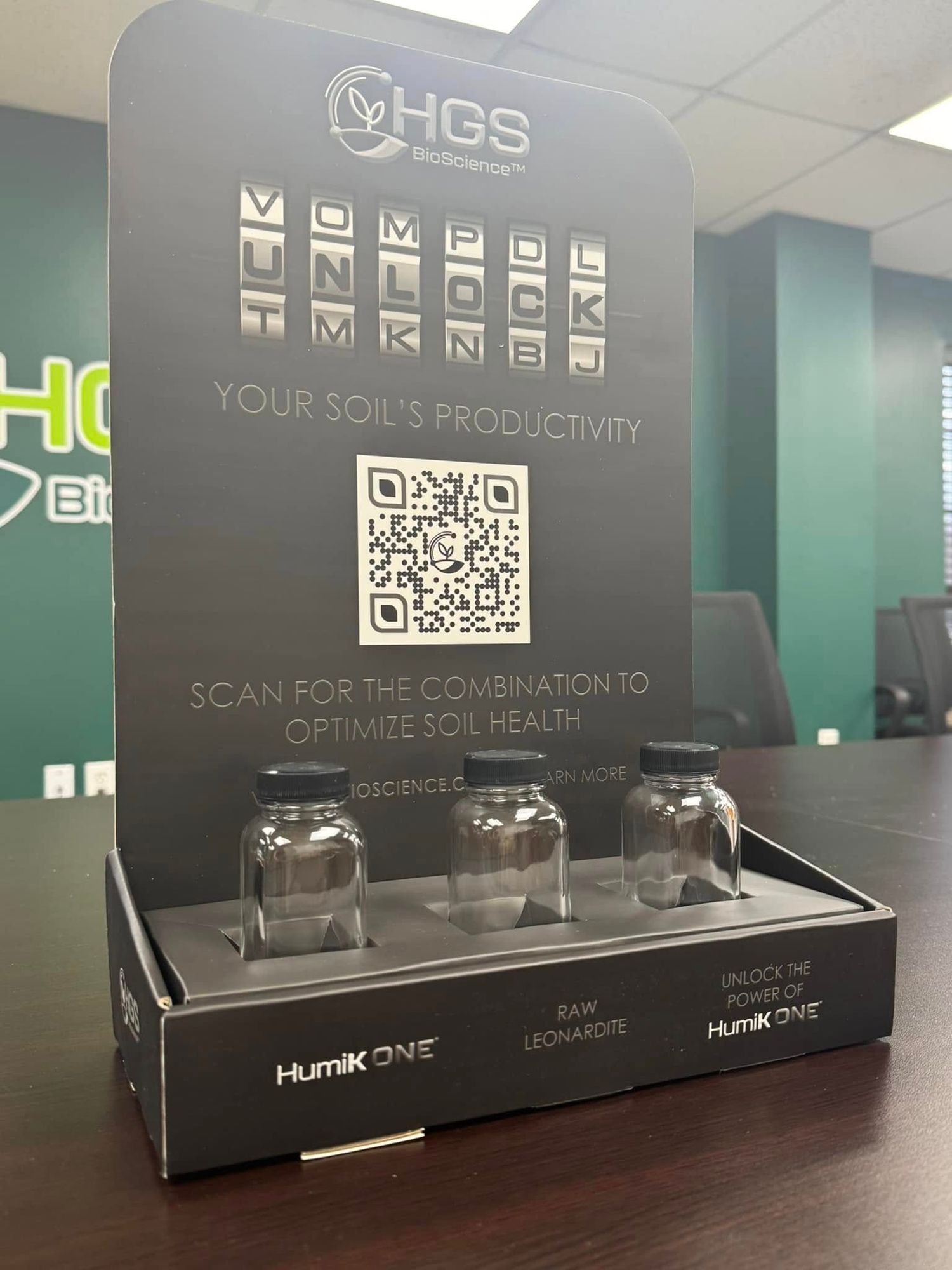 Product display stand with QR code for HGS soul health optimization system.
