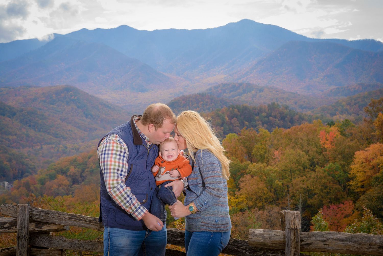 A cozy moment shared against the backdrop of autumn mountains and colorful fall foliage in the Great Smoky Mountains in Gatlinburg TN.